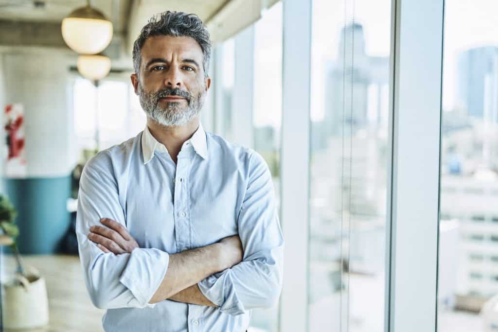 Confident Real Estate Agent Offering Advice for New Year