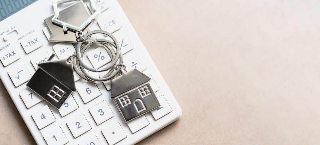 Figuring Mortgage Rates for 2020 with Calculator and Home Keychain