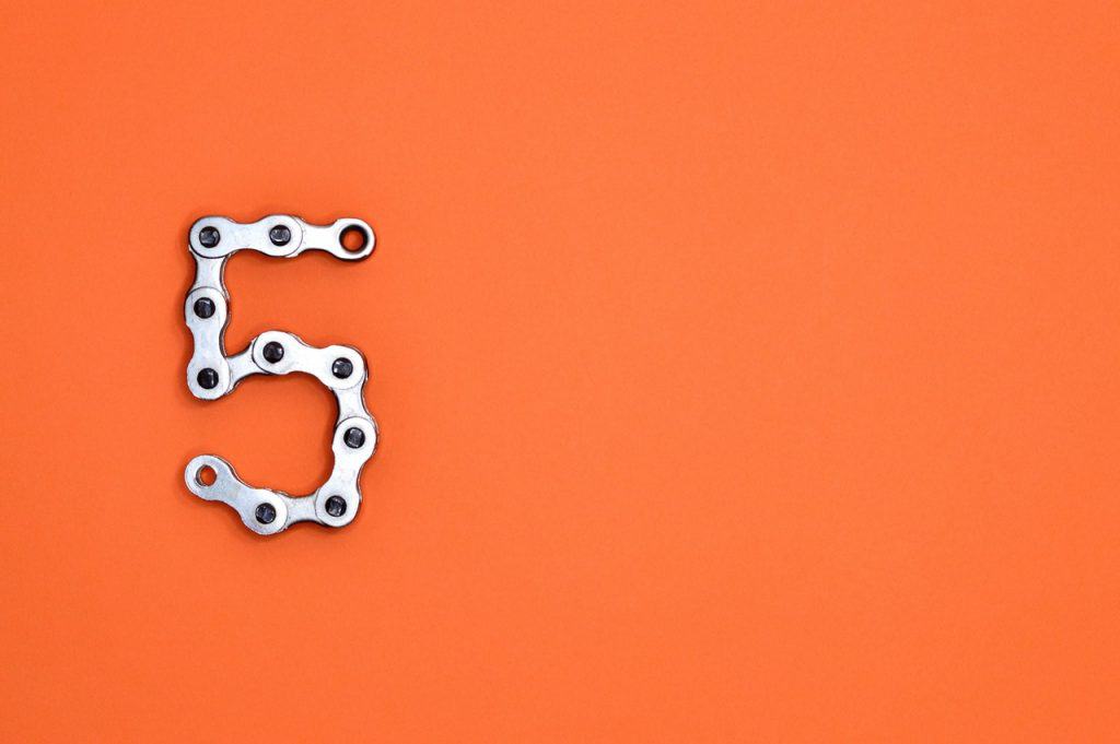 5 on Orange Wall