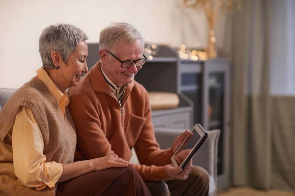 Happy Older Couple Ipad