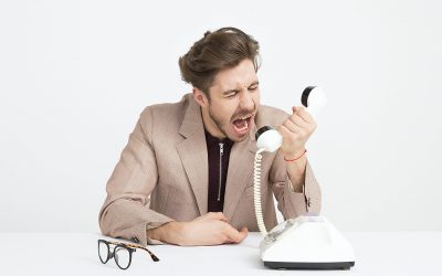Man Yelling into Phone