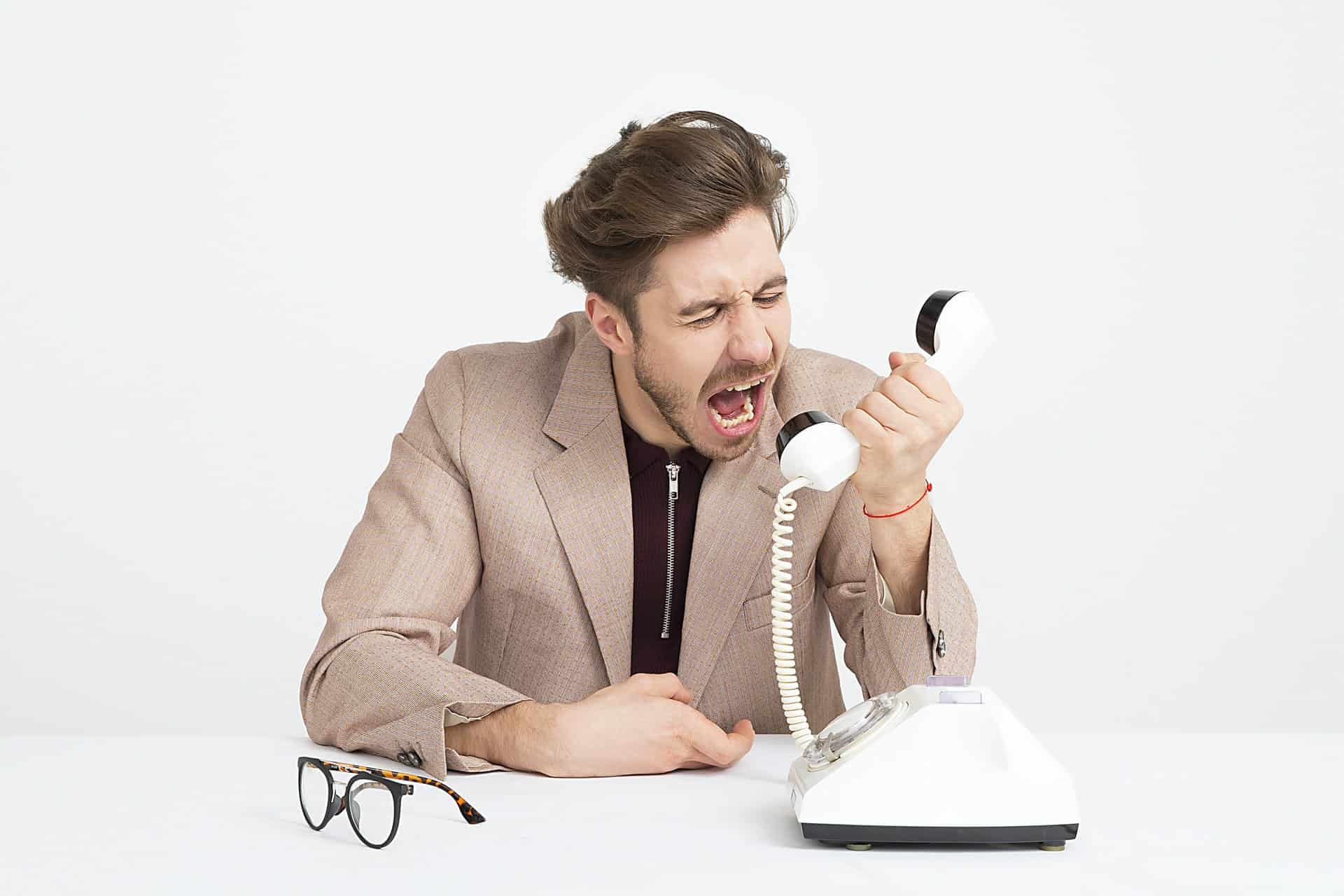 Man Yelling into Phone Man Yelling into Phone