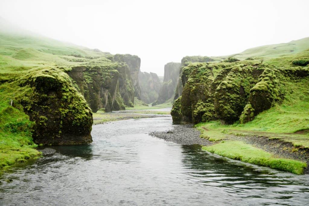 River In Middle Of Cliffs