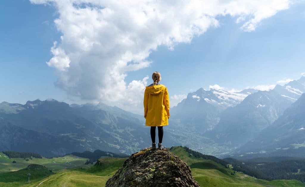 Woman Looking Out Over Valley