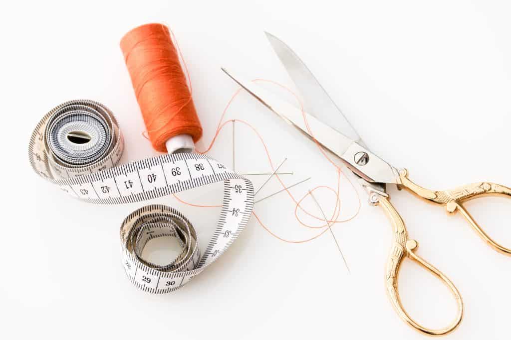 scissors cut measuring tape sewing
