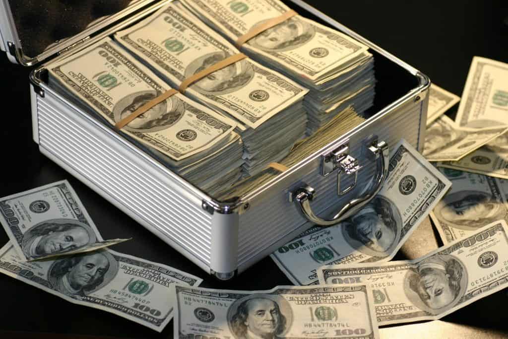 money suitcase stacks