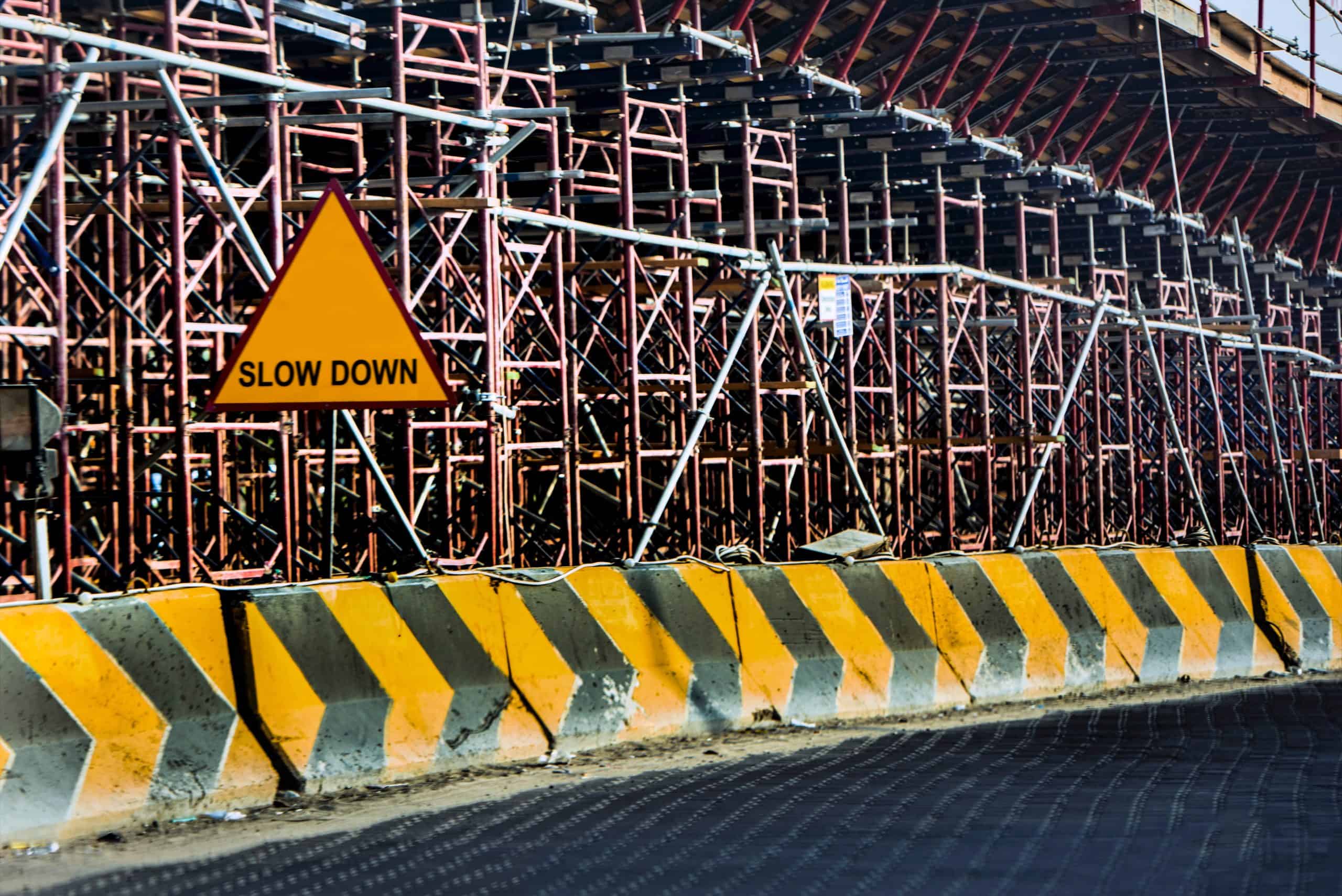 slow down construction sign slow down construction sign