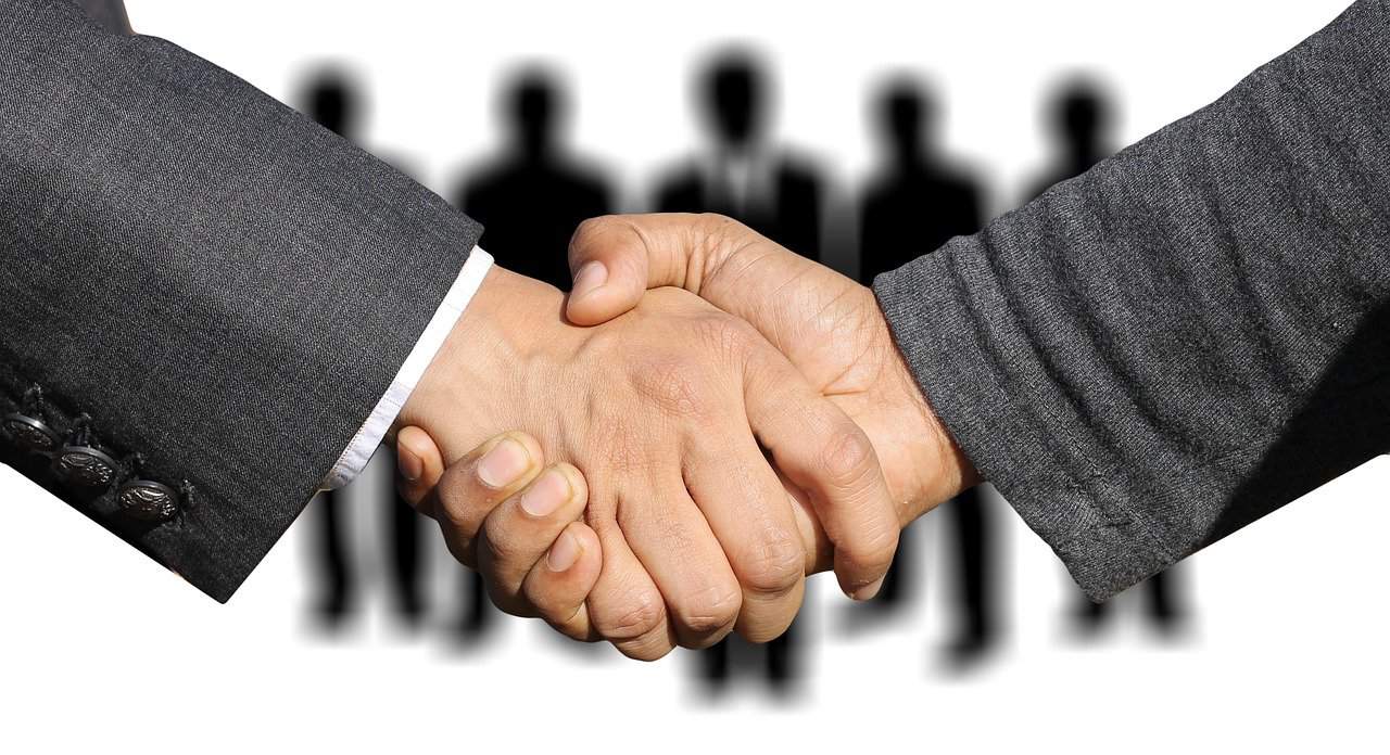 shaking hands business shaking hands business