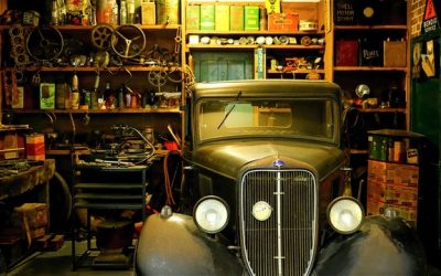 Vintage Ford truck in cluttered garage representing mental hobby shop