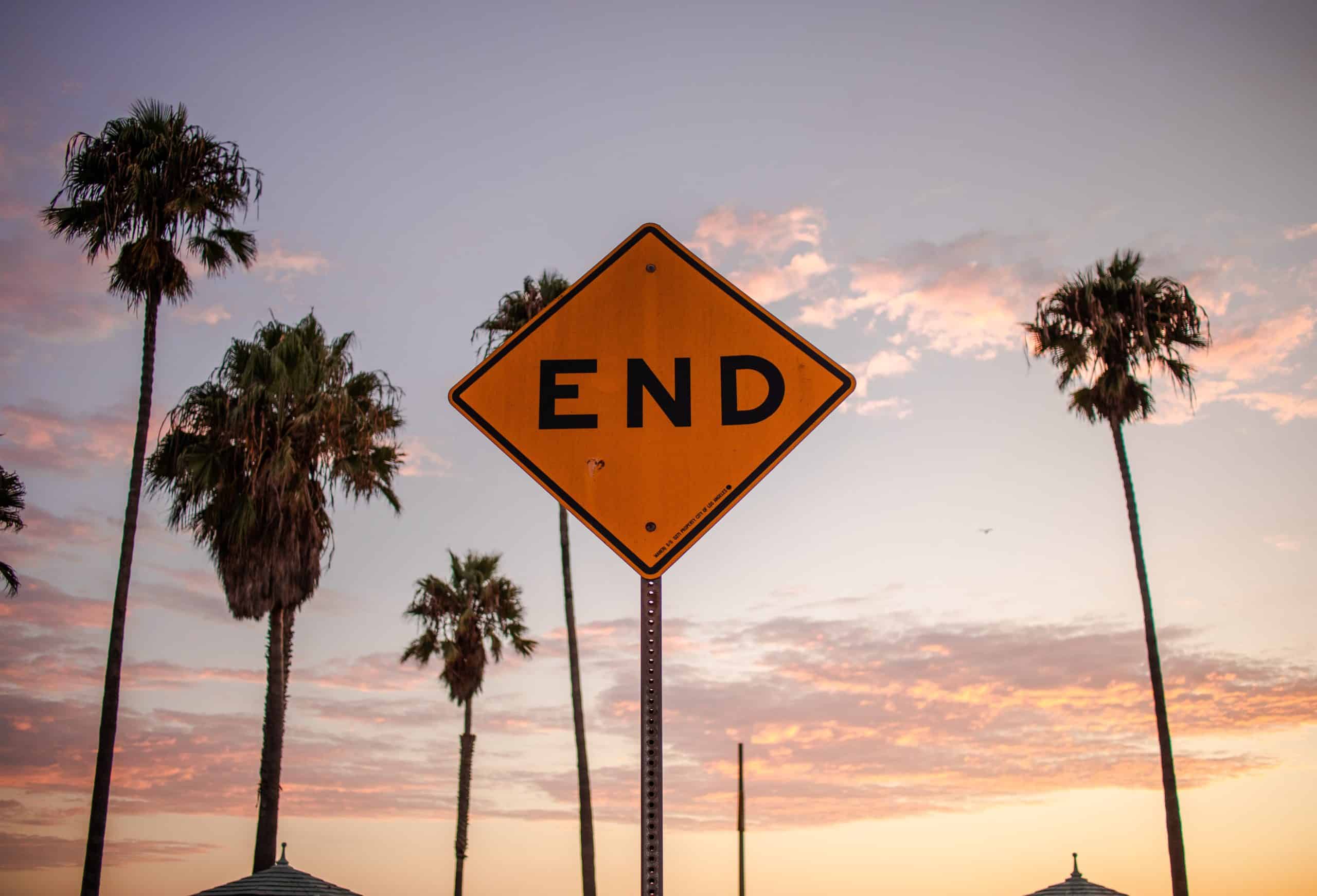 end sign sunset