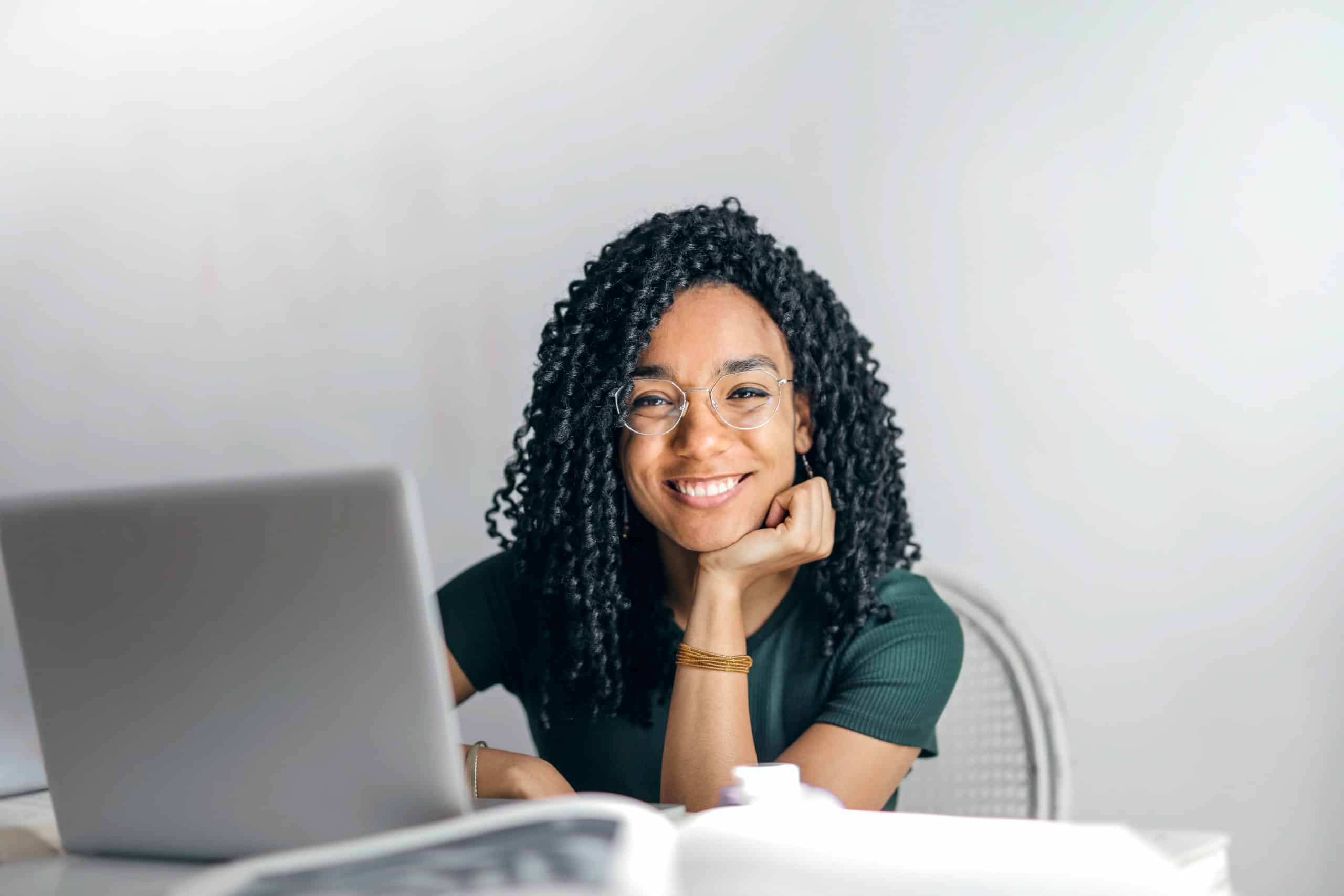 black woman happy smiling computer