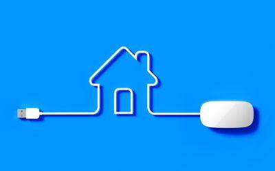 White Mouse Cable Forming A House Symbol on Blue Background