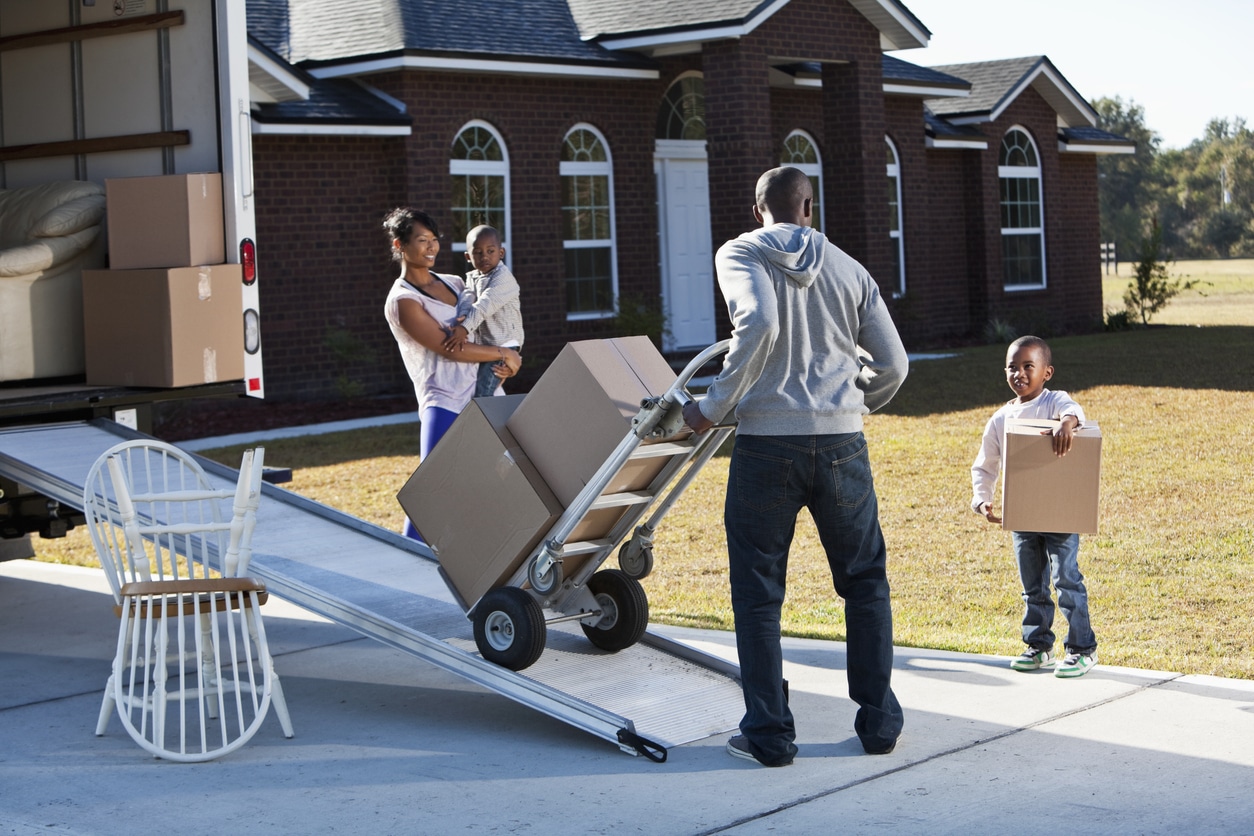 African American family moving house