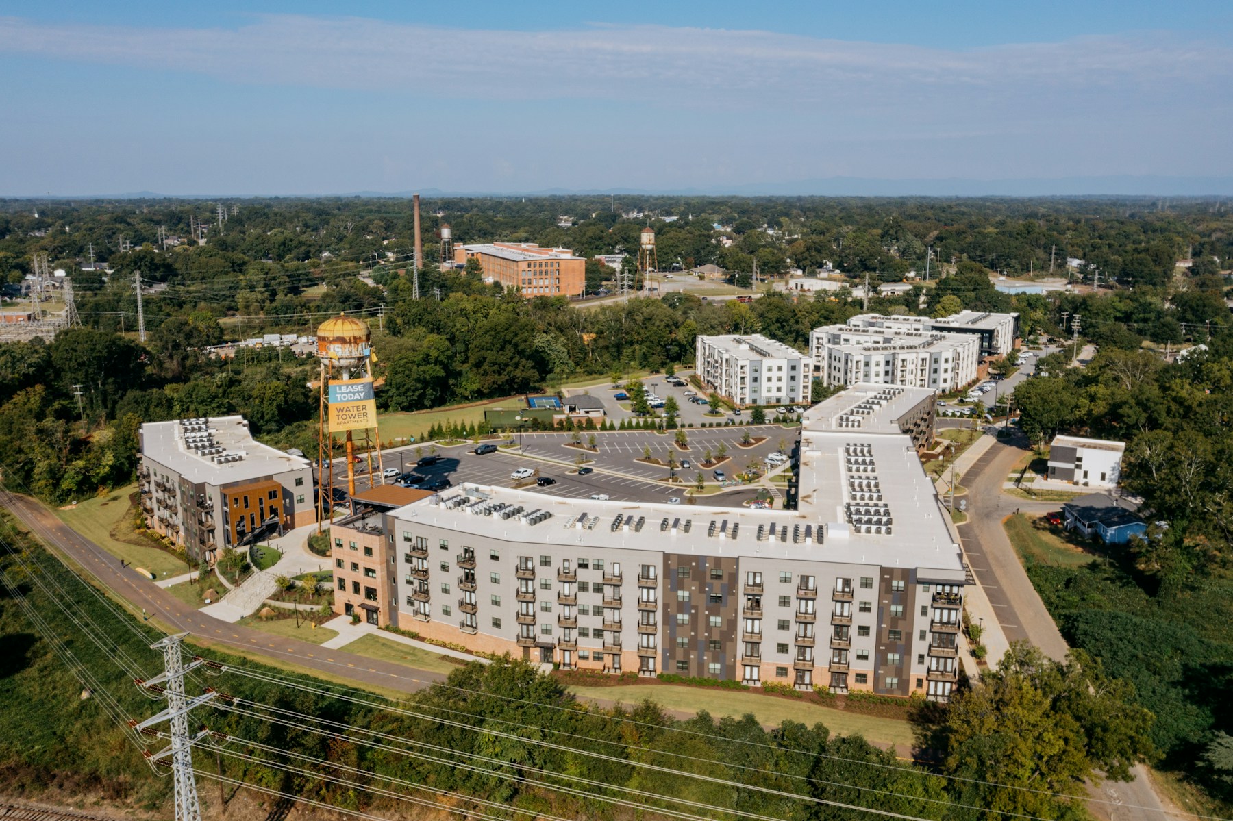 Agency Multifamily Lending — Zions Capital Markets Modern apartment buildings viewed from above, illustrating the multifamily properties financed through agency lending programs.