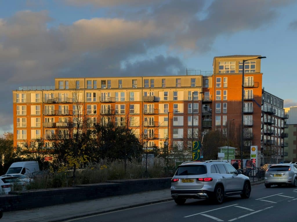 Modern apartment building in warm evening light, illustrating the U.S. rental market