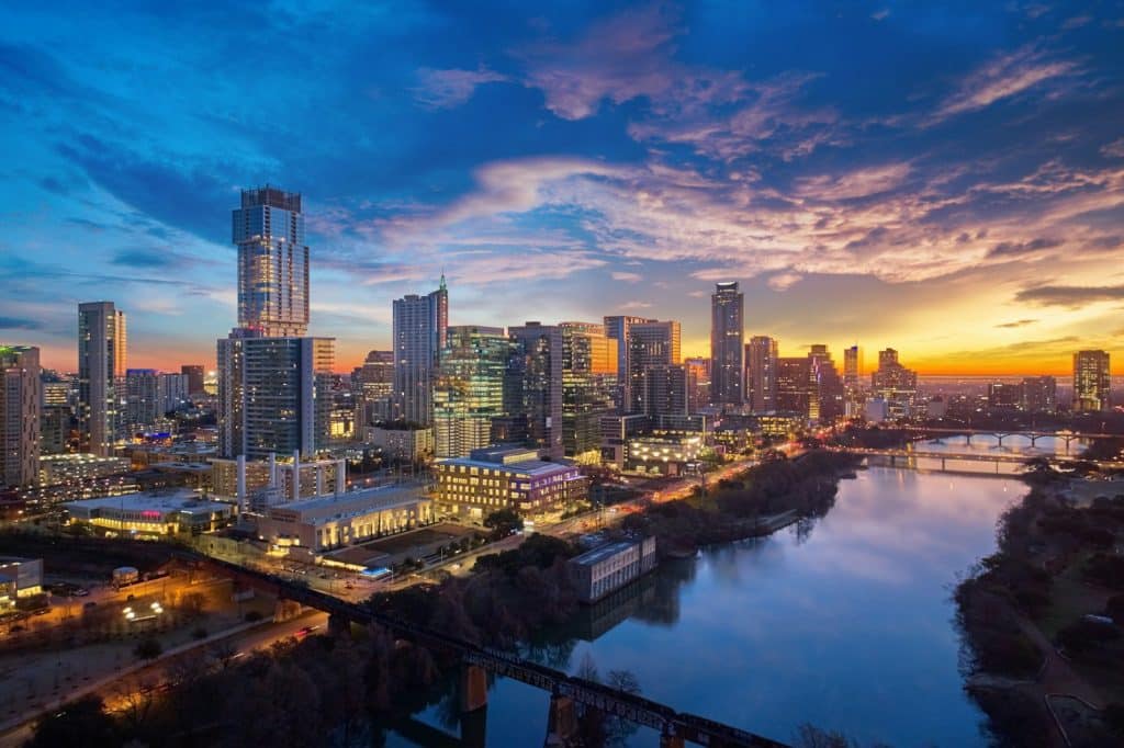 Austin, Texas skyline at sunrise, illustrating the market where Airbnb's Housing Accelerator is making its first housing investment.