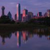 Downtown Dallas skyline at sunset viewed across the Trinity River