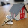 House model and keys representing Fannie Mae mortgage loan sale