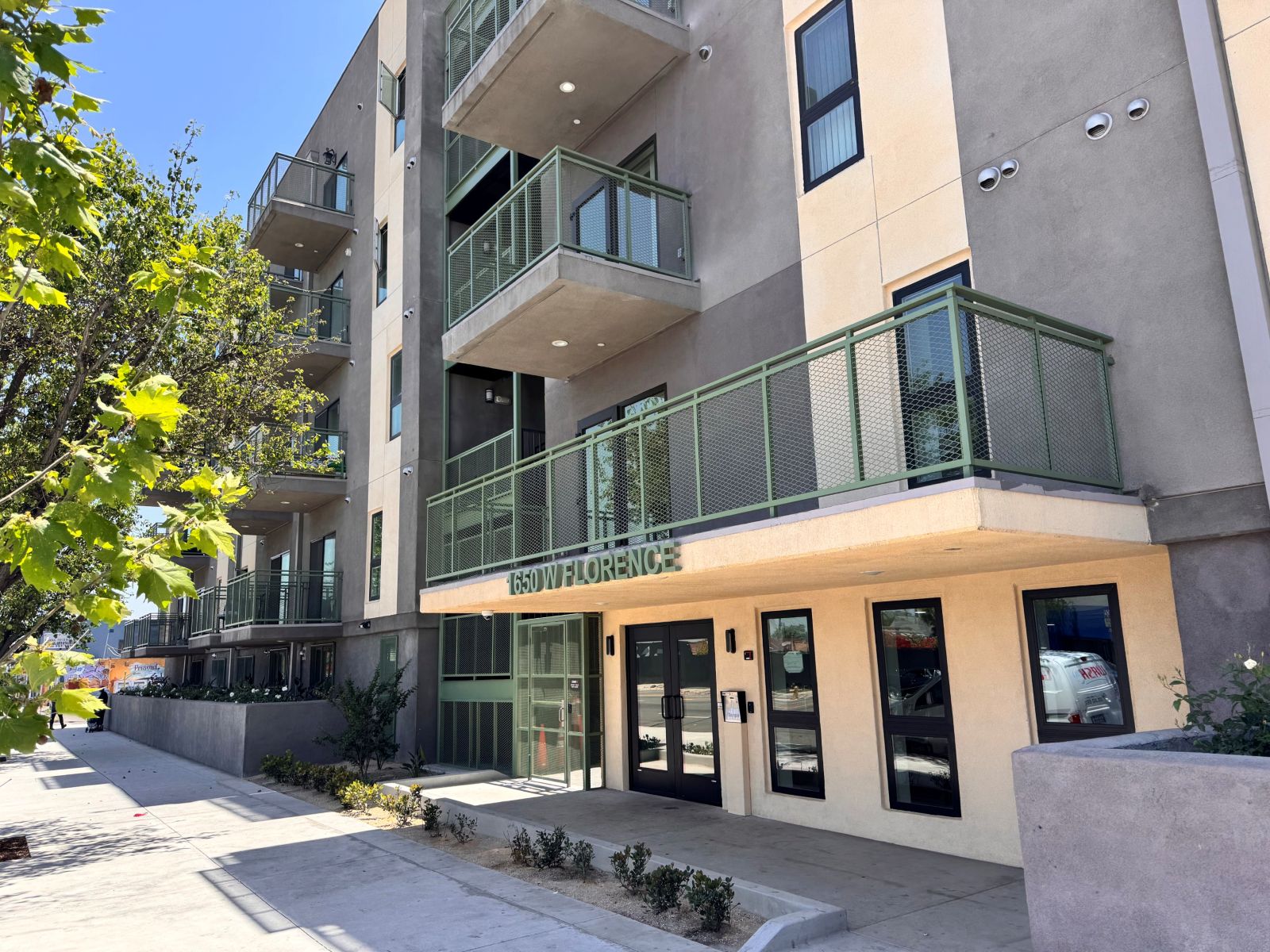 Federal Homelessness Fraud Cases and Housing Funds Los Angeles affordable housing building illustrating federal homelessness funding oversight
