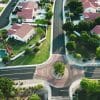 Aerial view across a residential neighborhood, illustrating homeowners building equity in their properties.
