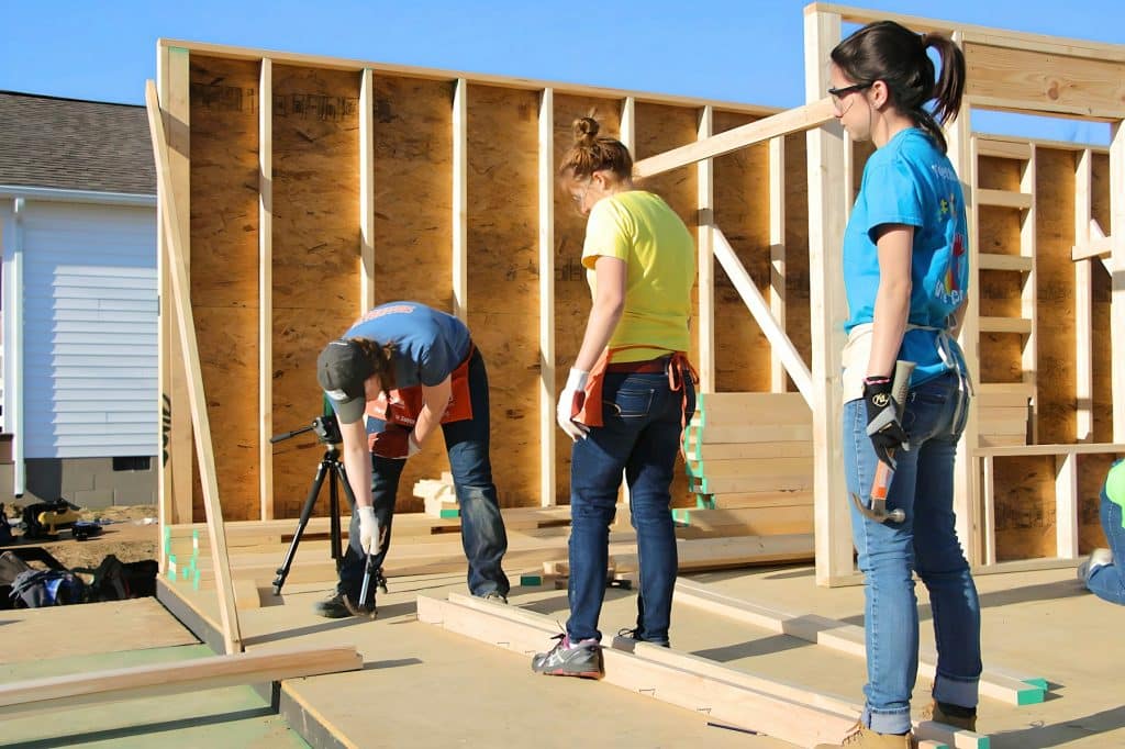 Construction crew working on a housing project, illustrating the national Let America Build housing supply campaign.