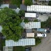 Aerial view of a manufactured housing community with rows of homes and neighborhood streets.