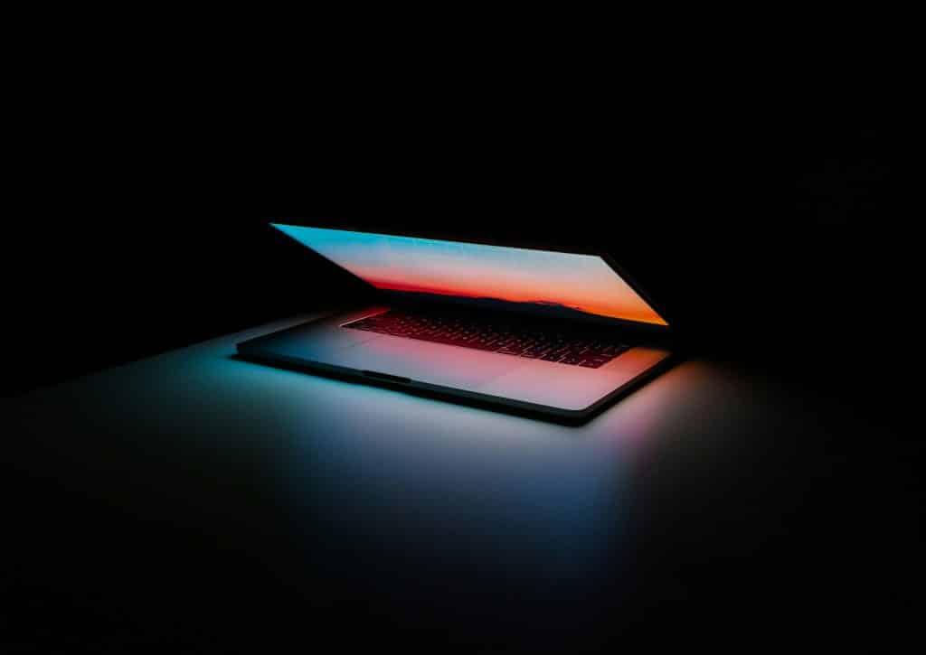 Laptop and digital workspace illustrating artificial intelligence adoption across mortgage lending and servicing