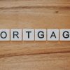 Mortgage documents and home financing materials illustrating rising mortgage rates