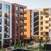 Apartment buildings illustrating the Independence Realty Trust and Centerspace transaction