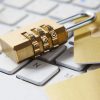 Padlock on a computer keyboard representing the alleged NFM Lending ransomware incident and federal lawsuits