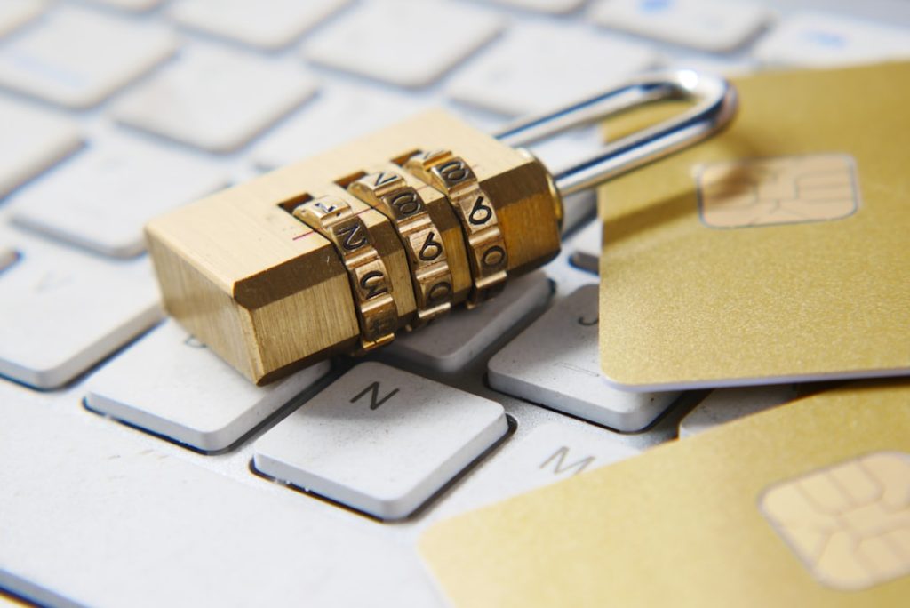Padlock on a computer keyboard representing the alleged NFM Lending ransomware incident and federal lawsuits