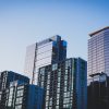 Commercial office buildings illustrating Northmarq's acquisition of Thirdline Capital Management