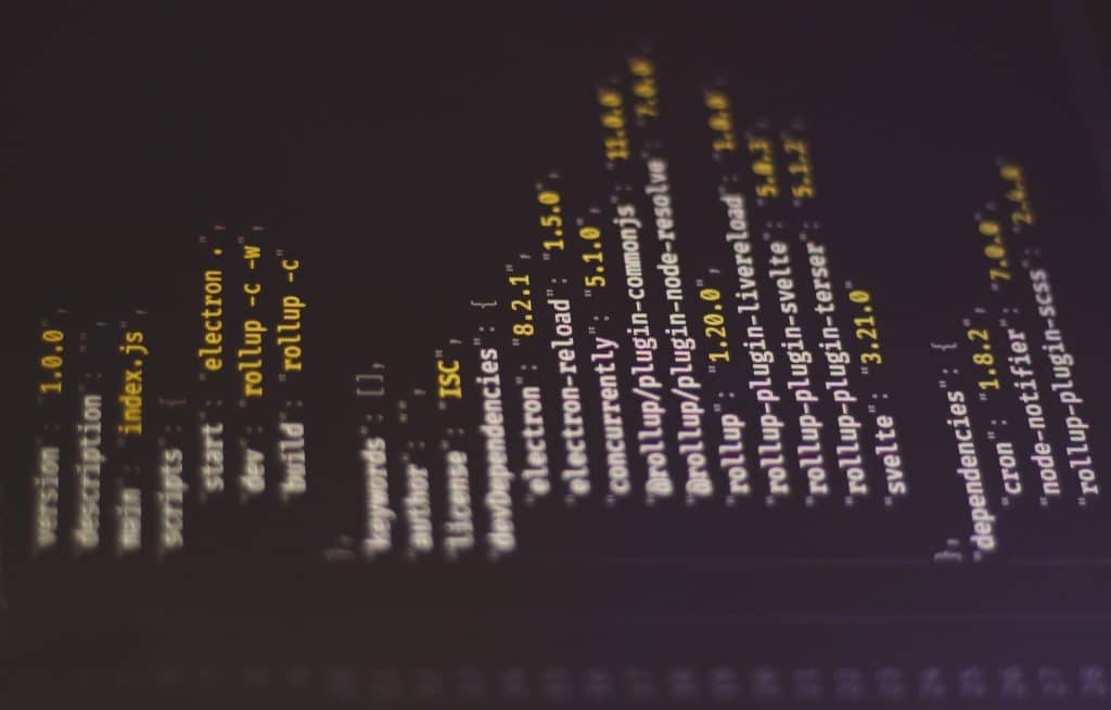 JSON code displayed on a computer screen, illustrating real estate data infrastructure and APIs