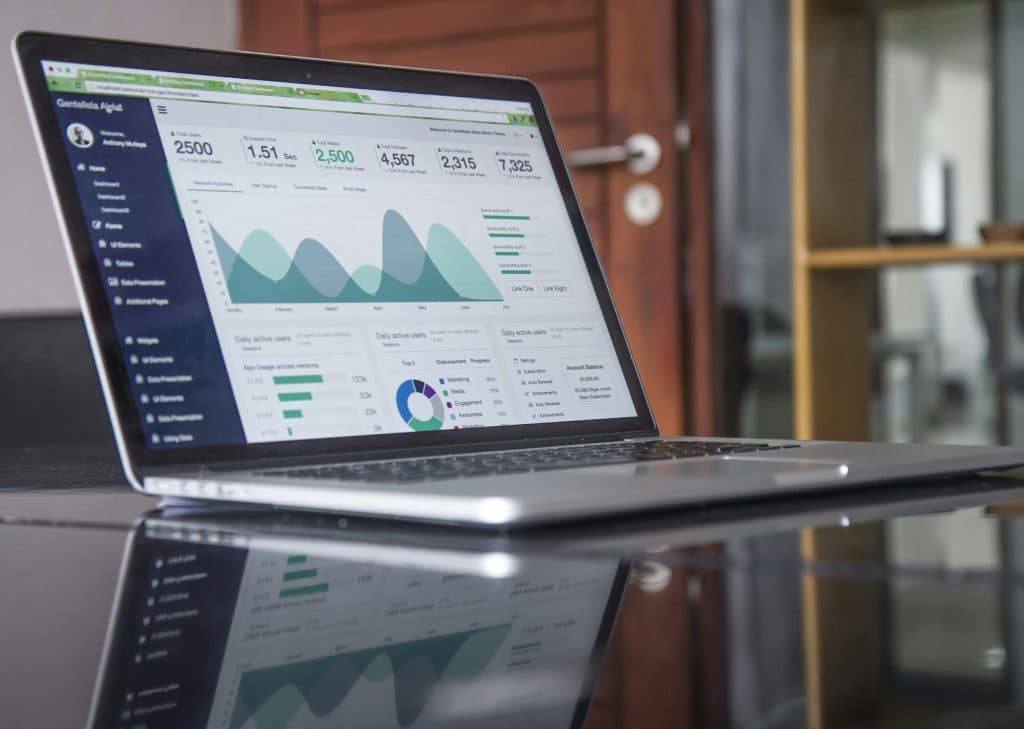 Data analytics on a laptop illustrating the MLS data and recruiting-technology dispute