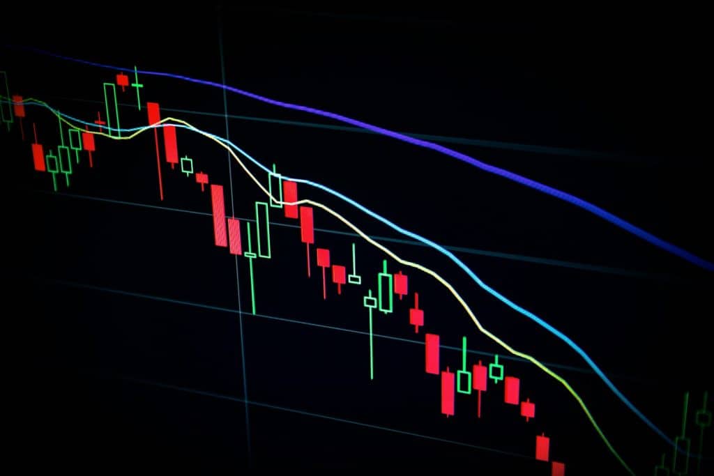 Stock-market trading screens illustrating the newly disclosed 9% investment stake in Redwood Trust