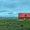 House in a rural landscape illustrating Section 184 Native American mortgage financing