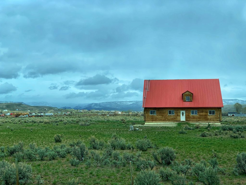 House in a rural landscape illustrating Section 184 Native American mortgage financing