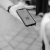 Consumer using a smartphone, illustrative image for digital home-shopping tools. Photo by Claudio Schwarz/Unsplash.