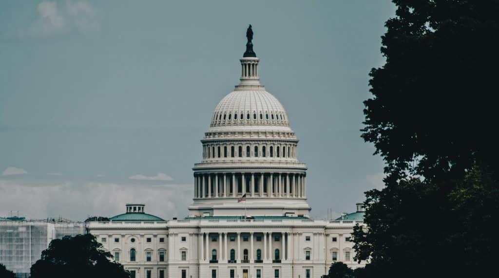 Modern white building in Washington, D.C., used as an illustrative image for a Fannie Mae capital-markets disclosure story
