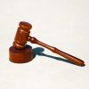 Judge’s gavel illustrating the federal antitrust lawsuit against Zillow involving agent referrals and Zillow Home Loans