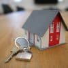 House model, documents and keys representing the Zillow RESPA lawsuit involving real estate and mortgage referrals