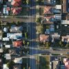 Aerial view of homes in a neighborhood, illustrating residential property listings