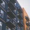 Multifamily housing illustration for CRE CLO loan vintage research; not identified loan collateral