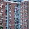 Multistory apartment building with balconies, illustrating urban multifamily ownership