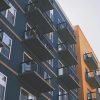Apartment buildings photographed from outside, illustrating public housing authority oversight