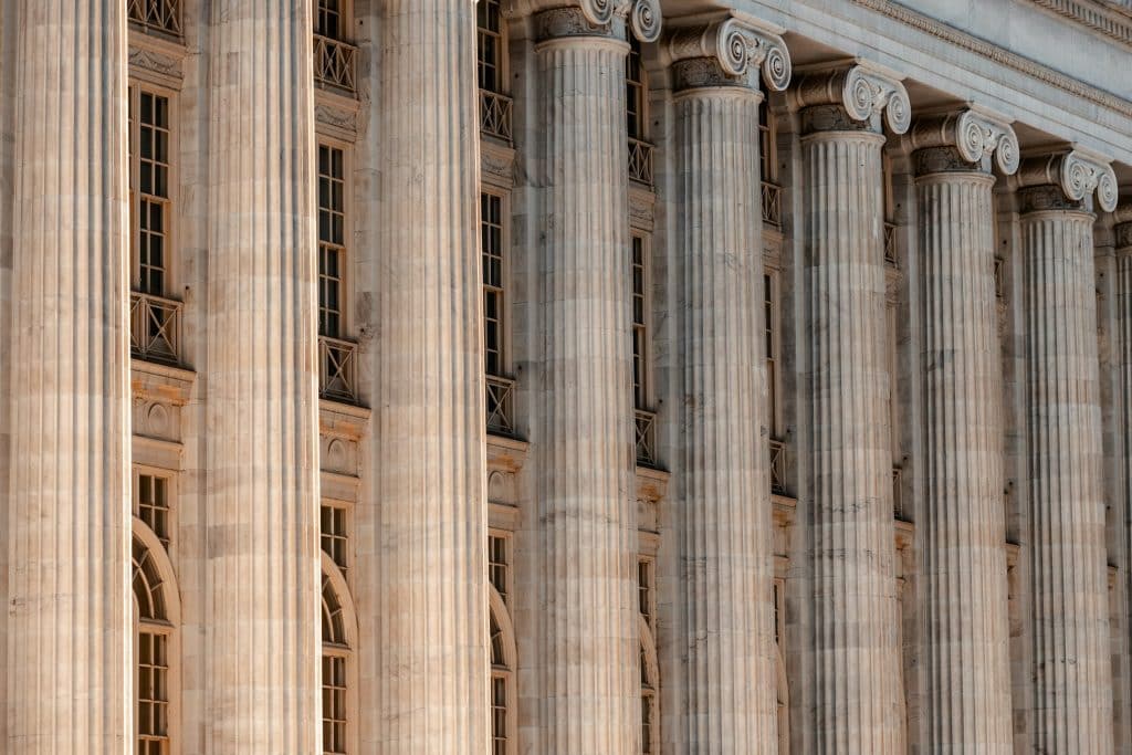 Classical civic building illustrating federal court proceedings; not the Missouri courthouse handling real estate commission settlements