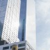 Modern commercial skyscrapers in daylight, illustrative for institutional real estate investment
