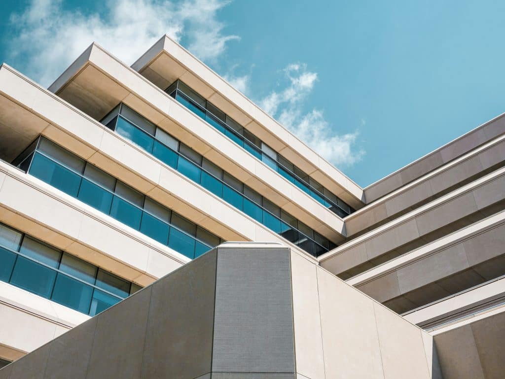 Commercial building construction site illustrating build-to-suit real estate investment
