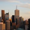 Illustrative photograph of commercial office towers for real estate lending merger news
