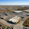 Aerial view of a commercial retail property illustrating shopping-center real estate, not a Phillips Edison property